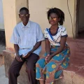 Pastor-Josef-Maganga-and-grand-daughter